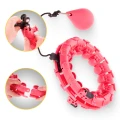 Hula Hop z obciążeniem i masażerem 4FIZJO, innowacyjne narzędzie do modelowania sylwetki i wzmacniania mięśni brzucha (RÓŻOWE) (6).webp