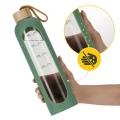 Szklana butelka na wodę 1 L 4FIZJO – bidon BPA free z etui silikonowym, ZIELONA (3).webp
